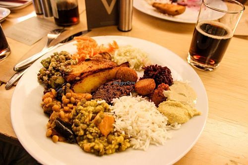 vegan selection from the buffet: falafels, lentil patties, carrot-, cabbage- and beetroot salads, lentil curry, baked potatoes, basmati rice, tahini, hummus, etc.  at DEVI Vegetarische Kostlichkeiten in Schaffhausen