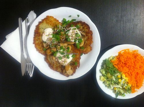 Potato pancakes with side salad, very delicious! at Tofu Bistro in Bielsko-biala