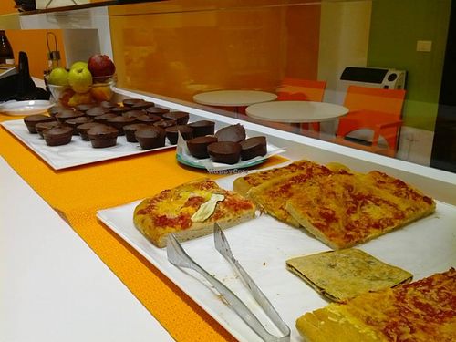 Vegan pizza and chocolate muffins  at Re Vegano in Reggio Emilia