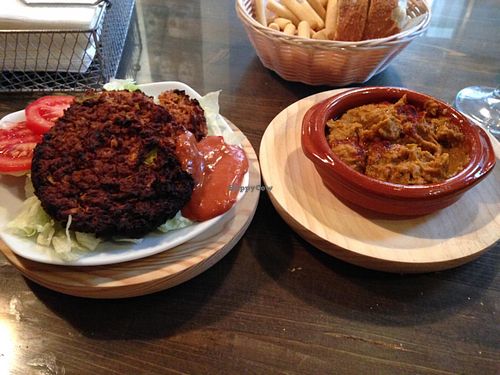 vegan burger and hommus. the burger is made of soy granulate, and has a delishous sauce on the side. both burger and hommus home-made and soo good. at La Isleta de La Vina in Cadiz