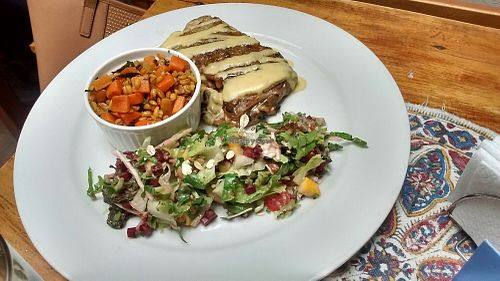 Bean & eggplant burrito, salad, carrots with grains at Prana in Envigado