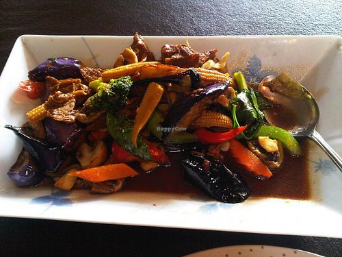 Pad-Khing-Jay: Stir fry with seitan ‘roasted duck,’ grilled eggplant, baby corn, bell pepper, mushroom, cabbage, and carrot, topped with chili sauce and sweet Thai basil at Lemon Grass in Livermore