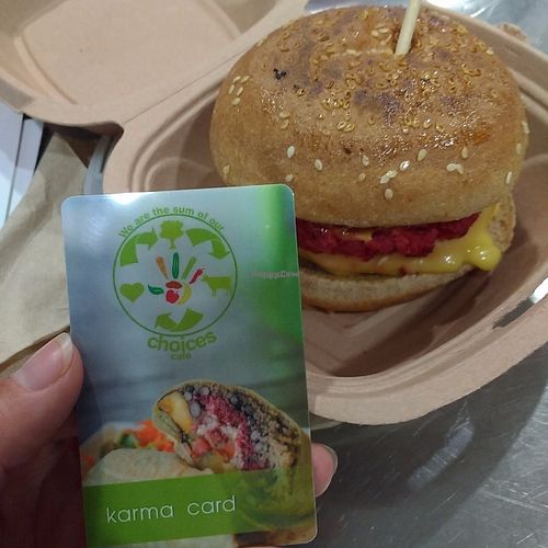 Biggie burger and I got my karma card! at Choices Cafe in Coral Gables