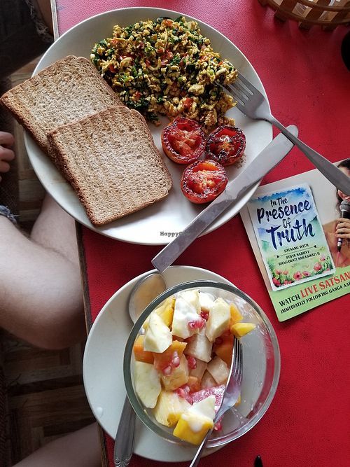 Excellent tofu scramble breakfast and a nice fruit salad with coconut milk on top. at Zorba Organic Restaurant in Rishikesh