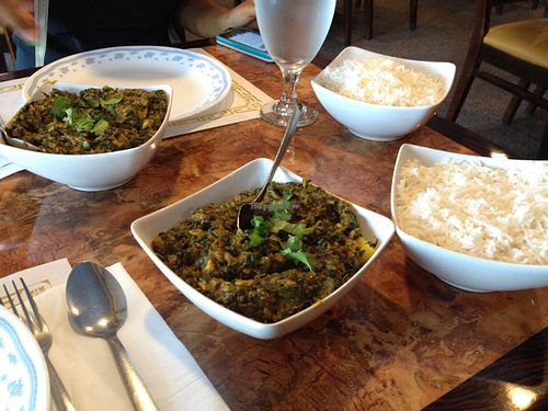vegan Aloo Saag in the forefront; vegetarian Aloo Saag in the back at Ruchi Vegetarian Indian Cuisine in Chandler