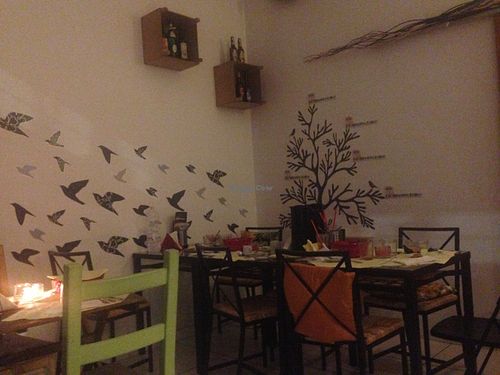 a relaxing dining area at Arcobaleno Vegetariano in Milan