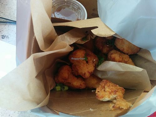 panko breaded cauliflower, served with an orange dipping sauce. OK, yet could have used for spices for flavor in the breading.   at Veggie Grill in Walnut Creek