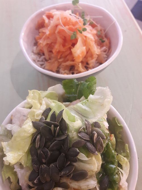 Tapas sized salad with vegan cheese + kimchi with rice. Especially kimchi was delicious. at Astrid in Malaga