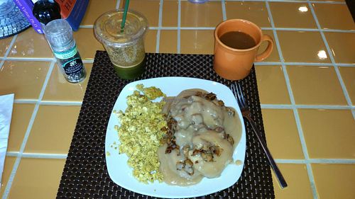Biscuits & Gravy with Scrambled tofu eggs, All Is Well Juice & coffee at Violette's Vegan Organic Cafe and Juice Bar in Las Vegas