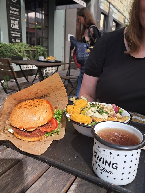 Swing burger & caesar bowl at Swing Kitchen - Schottenfeldgasse in Vienna