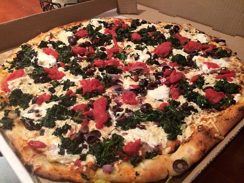 Vegan Athen pizza with crushed tomatoes, arugula, kalamata olives, spinach, and red onions.  at Vannucchi Brothers in Hollywood