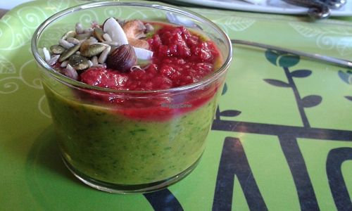 Smoothiebowl with mango, spinach, raspberry, coconut, hazelnut and almond milk. at Satori in Malmo