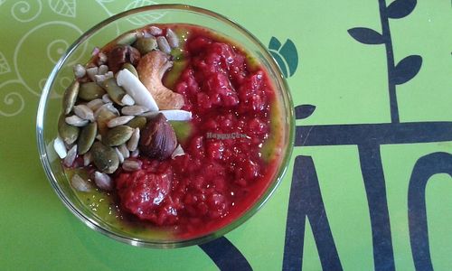 Smoothiebowl with mango, spinach, raspberry, coconut, hazelnut and almond milk. at Satori in Malmo