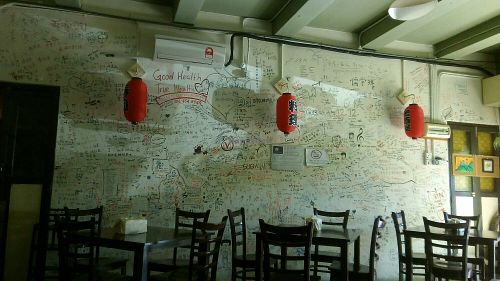 Messages on the wall at Sushi Kitchen in Alor Setar