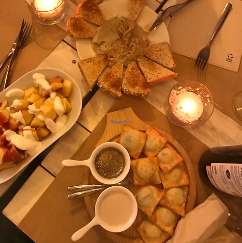 raviolis, patatas...  at Punto Vegano in Madrid