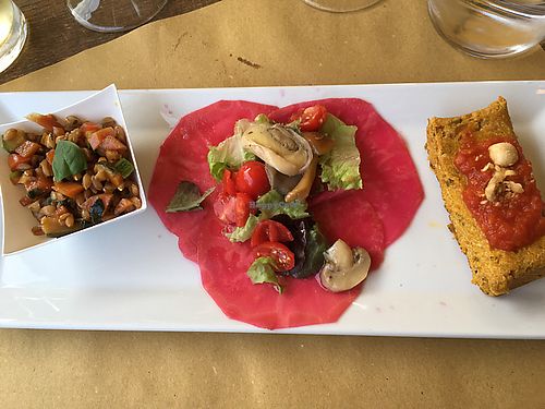 Farro salad, celeriac carpaccio, tofu with laurel and cream of almonds and hazelnuts at Casa Scaparone in Alba