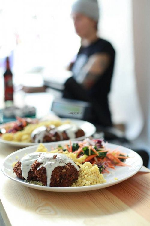 Baked beetroot-chickpea chop + millet with tomato sauce + salad with kale and leeks (GF) at Lokal Vegan Bistro in Warsaw