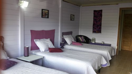 3 single beds bedroom at Puerta de Jade in Alajuela