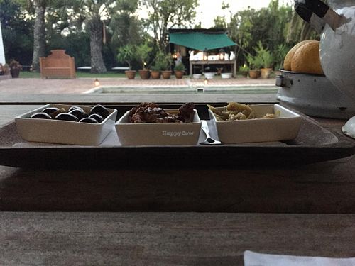 Smoked walnuts with babaganus smoked aubergines sauce at Garzon Restaurant in Garzon