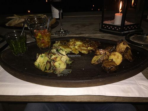 Trio of potatoes with a taragon pesto and peppers sauce in oil. Apparently Francis Mallmann is some sort of Guru at least when it comes to potato cooking. Super great. at Garzon Restaurant in Garzon