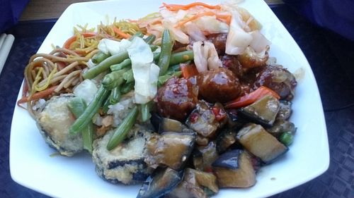 Mixed buffet plate: noodles, cabbage (very nice), green beans, soya balls (ok), aubergine/eggplant, deep fried sushi (I recommend non deep-fried but this is all they had left that day!)  at 96 Zen Etterem in Budapest