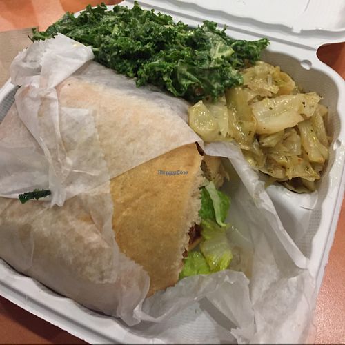 Black bean burger, cooked cabbage,kale salad at NuVegan in College Park