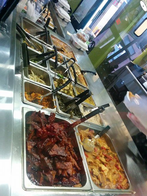 Buffet entrees and sides, BarBQ tofu, Ginger tofu in front at NuVegan in College Park