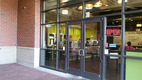 Door to NuVegan from the corridor between the parking area and the sidewalk at NuVegan in College Park