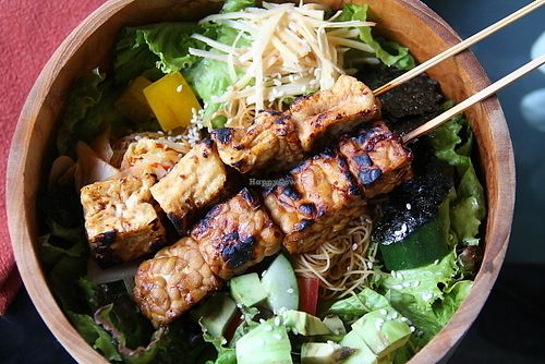 Asian bowl with tofu and tempe satays.  at Kismet Bar & Kitchen  in Ubud