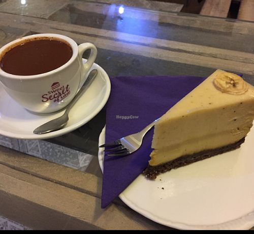 hot chocolate and mango-banana cake. the cake tastest great and the chocolate is very thick! at Sweet Secret of Raw in Prague
