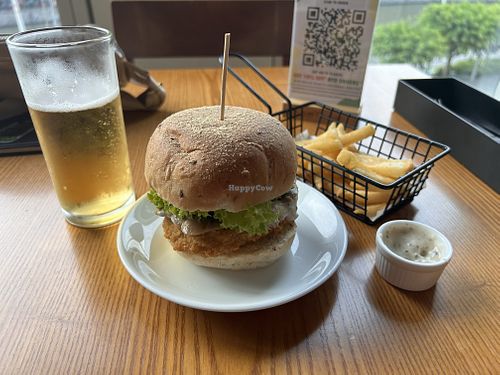 Lion’s Mane burger, truffle fries, non-alcoholic beer  at nomVnom Bistro - Clarke Quay in Central Singapore