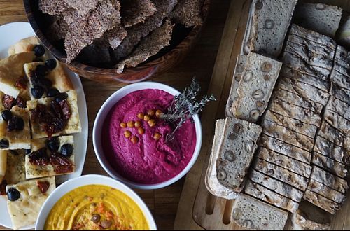 homemade gluten free bread, raw crackers and spreads on Sunday brunch  at Barkett in Berlin