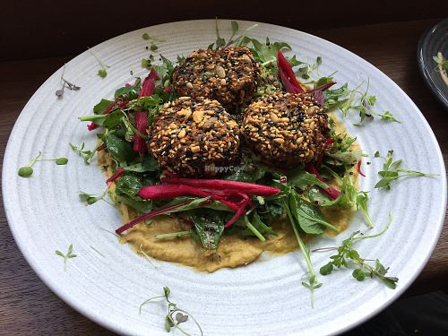 Cauliflower fritters with pumpkin hommus at Urban Projuice in Albert Park