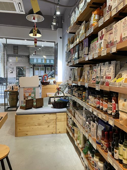 In the store - view looking out and selection of grocery items at Spicebox Organics - Caine Rd in Hong Kong Island