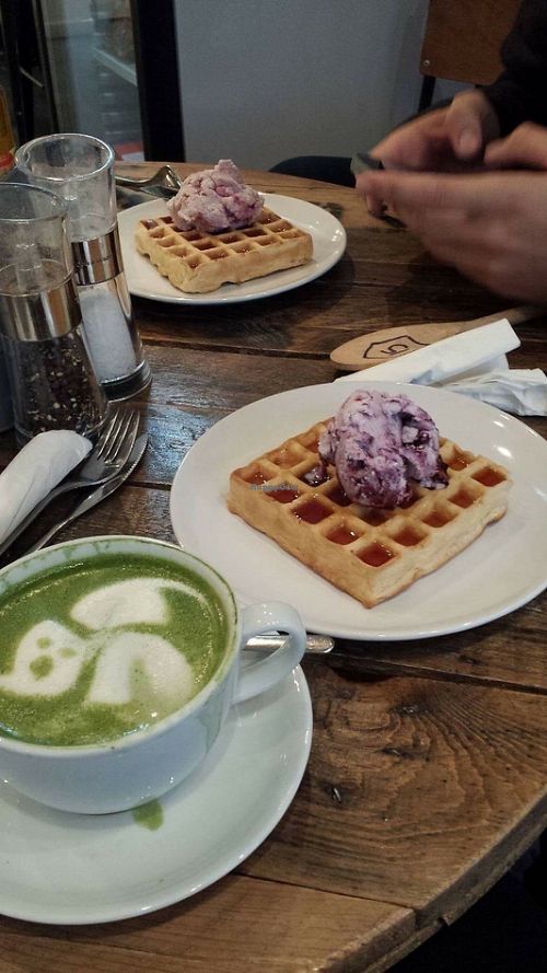 Matcha latte and waffle with blueberry ice-cream and maple syrup! at The Den at Twenty Three in Colchester
