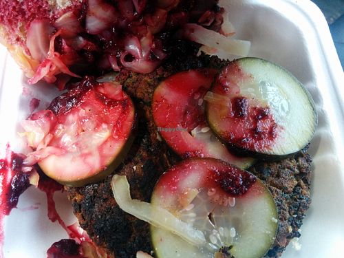 Fully dressed kale burger on handmade buns. at Amazing Kale Burger in Evanston