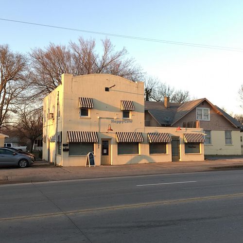 Outside the Polka Dot Fox. Tables and chairs out front this summer along with a privacy wall! at Polka Dot Fox Coffee and Micro-Bakery in Joplin