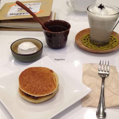 Pancake with sweat soya beans pate & roasted green tea latte  at Maaru Organic Cafe in Himeji