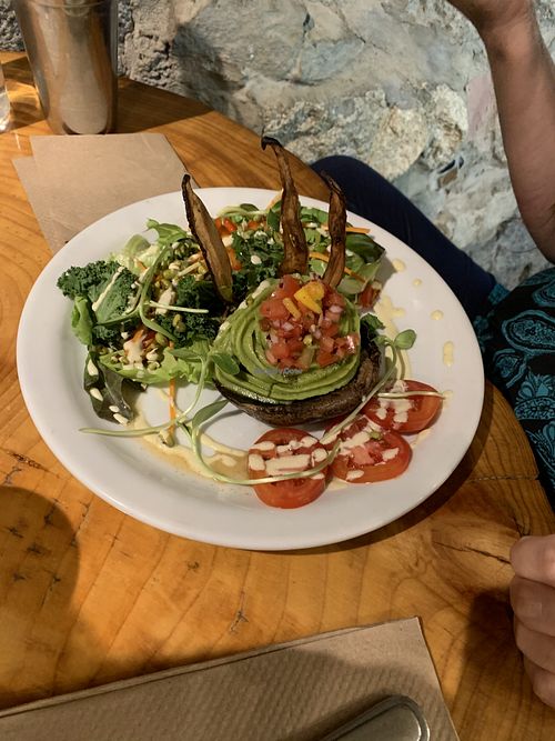 A plant based vegan burger on portobello mushroom. at Indigo Age Cafe in Vancouver