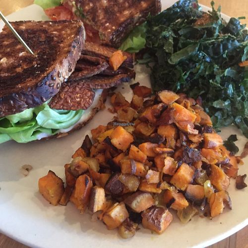 Tempeh, Lettuce & Tomato sandwich w sweet potato hash and kale salad at True Food Kitchen in Atlanta