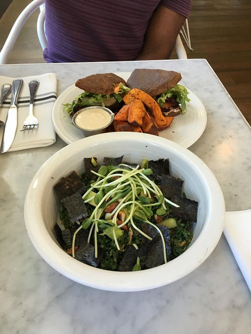 Salad and burger at Cafe Gratitude - DTLA in Los Angeles