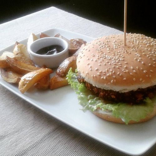 they serve two different burgers - one is sweet potatoes burger and another one with fried tofu burger. at GYVAS baras in Vilnius