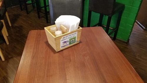 HappyCow stickers on every table at GYVAS baras in Vilnius