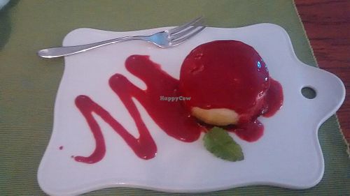 Cashew cake with raspberry sauce at Ambasada in Warsaw