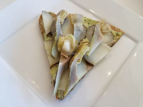 Artichoke Pizza with a creamy garlic sauce! Yum! at LOVJuice in Boca Raton