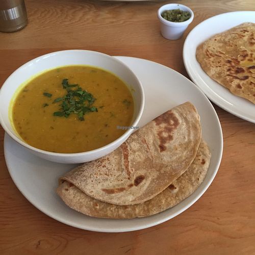 Red lentil daal with roti and parantha. at Ranjit's Kitchen in Glasgow