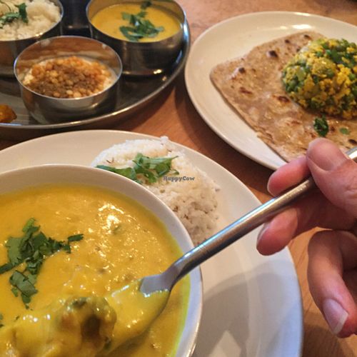 Thali, pakora curry with rice, scrambled paneer with a parantha. at Ranjit's Kitchen in Glasgow