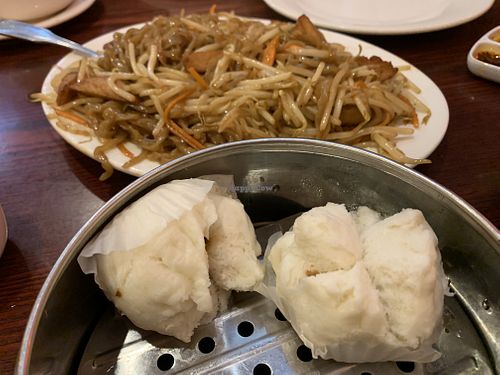 Vegan steamed pork buns and chicken noodle dish  at Bodhi Kosher Vegetarian Restaurant in New York City