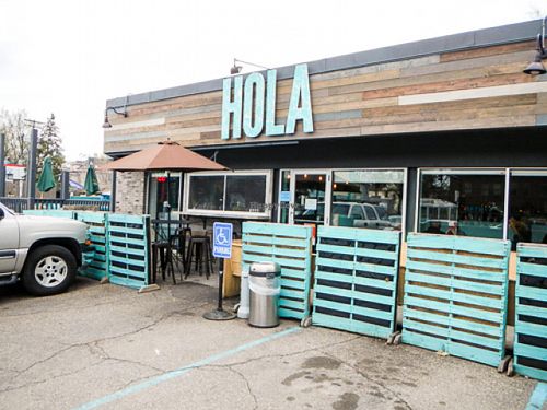 outside at Hola Arepa in Minneapolis