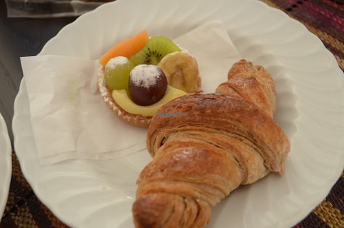 Fruit-covered pastry and croissant at Fratelli Piermattei in Rome